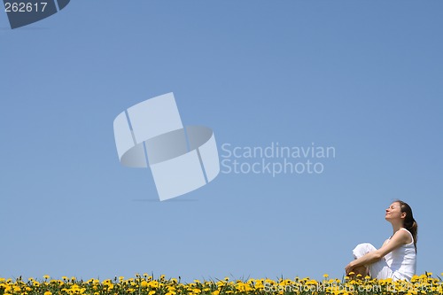 Image of Pretty woman enjoying sunshine