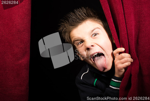 Image of Child stick out his tongue