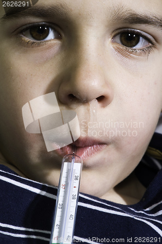 Image of Sick child in bed.