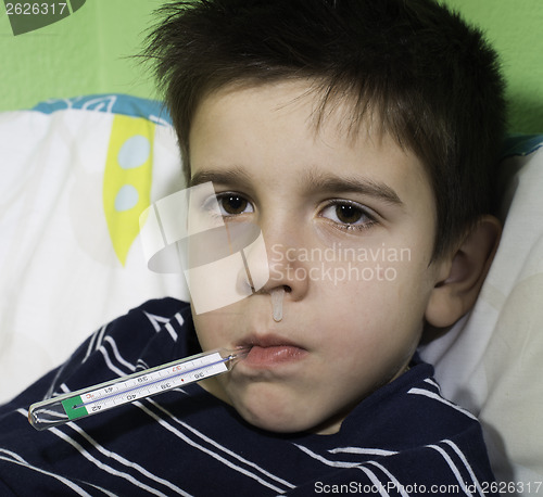 Image of Sick child in bed.