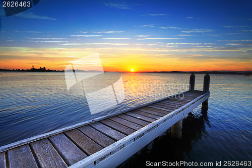 Image of Setting sun behind the boat jetty, Lake Maquarie