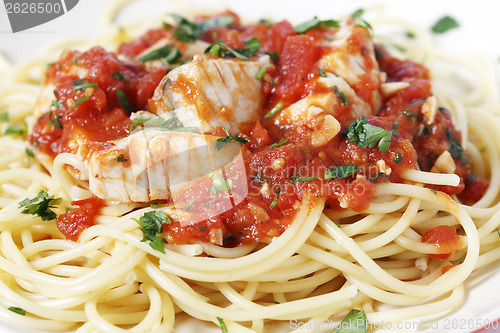 Image of Spaghetti all'arrabbiata with fish side view