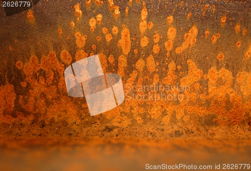 Image of Old rusty metal plate heavily aged