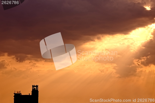 Image of Artistic sunset with bright sky and clouds