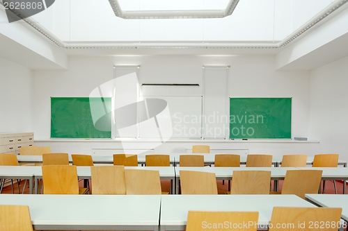 Image of Desk and chairs in a classroom