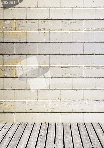 Image of brick wall and wooden floor