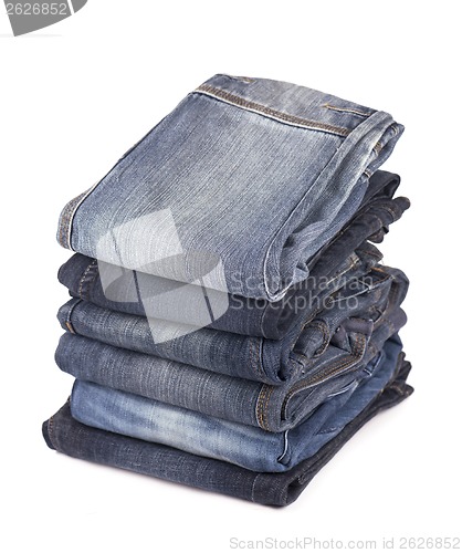 Image of Stack of blue jeans