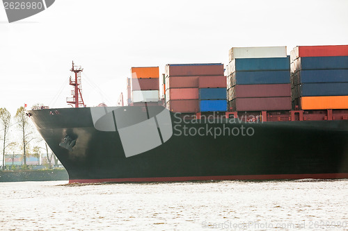 Image of Fully laden container ship in port