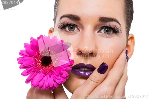 Image of Beautiful woman in purple make-up