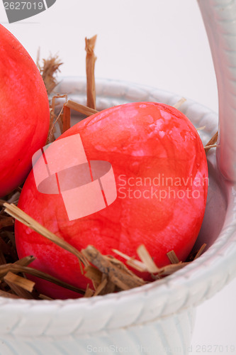 Image of Basket of brightly coloured Easter Eggs