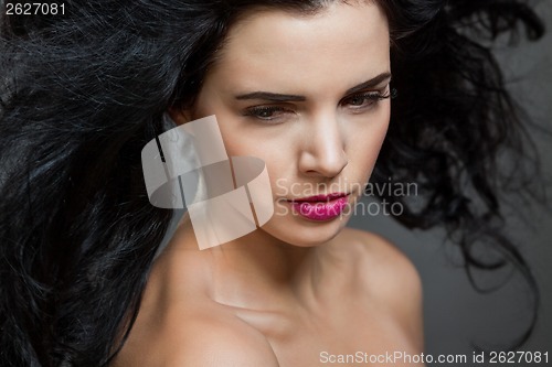 Image of Beautiful woman with a gentle serene expression