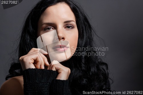 Image of Dark moody portrait of a brunette beauty