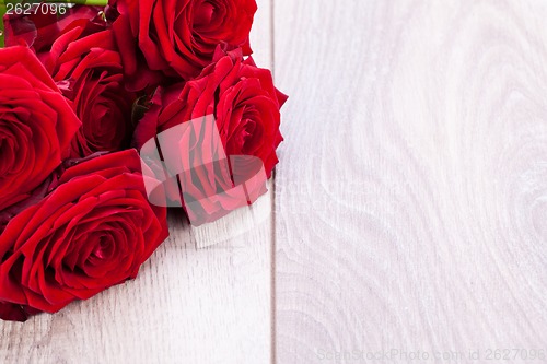 Image of beautiful red rose flower on black background