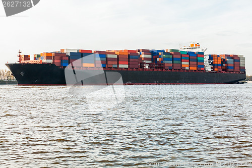 Image of Fully laden container ship in port