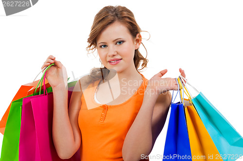 Image of Happy attractive young shopaholic