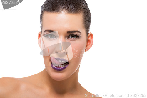 Image of Graceful attractive woman with purple lips and nails