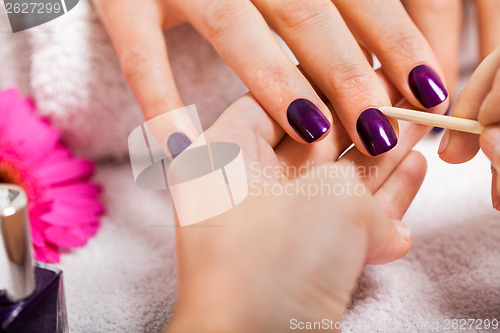 Image of manicure making in beauty spa salon