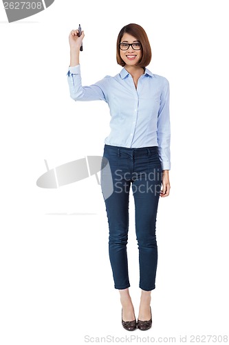 Image of young successful business woman writing with pen isolated