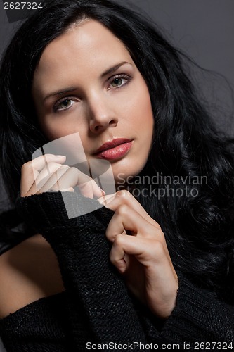 Image of Dark moody portrait of a brunette beauty