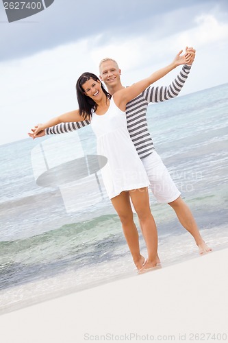 Image of smiling young couple having fun in summer holiday