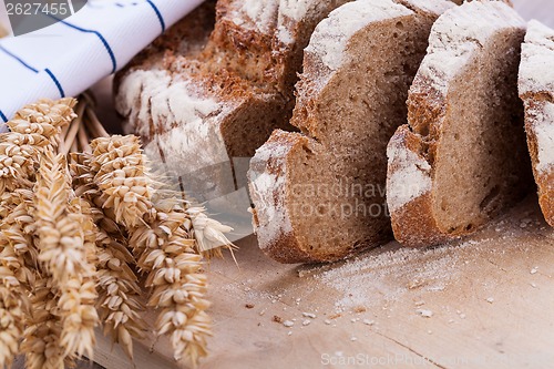 Image of homemade fresh baked bread and knife 