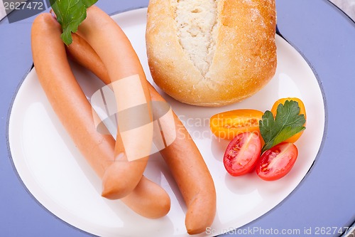 Image of tasty sausages frankfurter with grain bread 