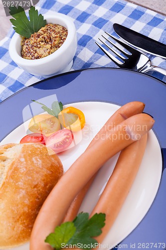 Image of tasty sausages frankfurter with grain bread 