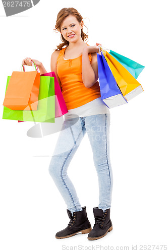 Image of attractive young woman with colorful shopping bags