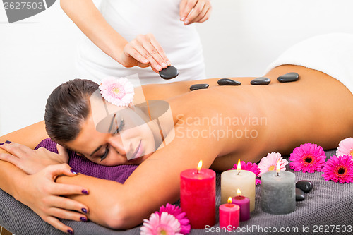 Image of Beautiful woman having a back massage