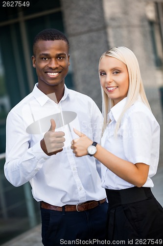 Image of young smiling african man and blond woman 