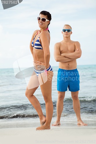 Image of smiling young couple having fun in summer holiday