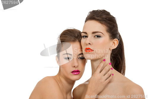 Image of two attractive young woman with colorful lipstick 