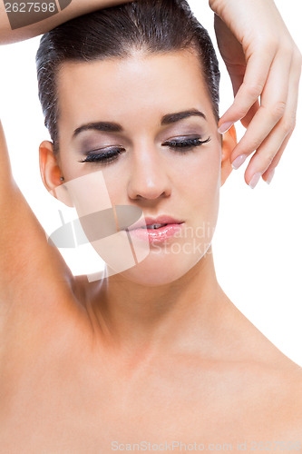 Image of beautiful young woman with perfect skin and soft makeup