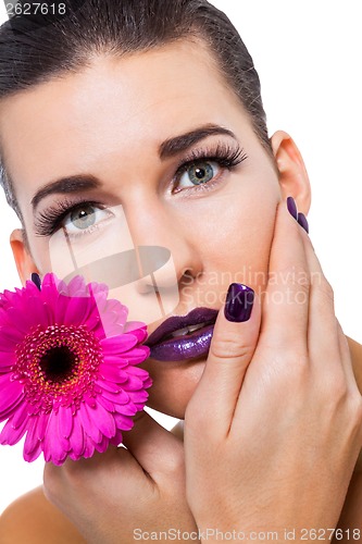 Image of Beautiful woman in purple make-up