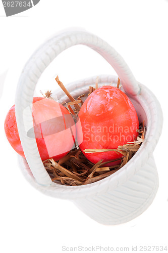 Image of Basket of brightly coloured Easter Eggs