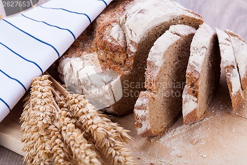 Image of homemade fresh baked bread and knife 