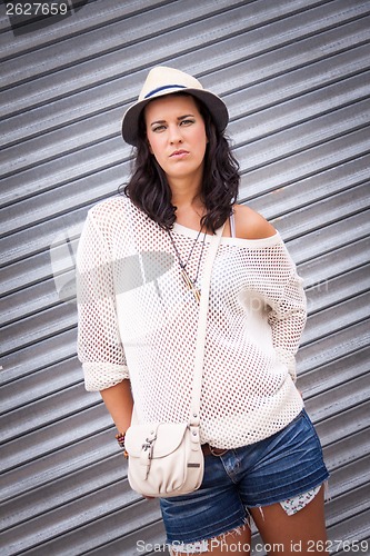 Image of young attractive woman in summer trendy fashion 