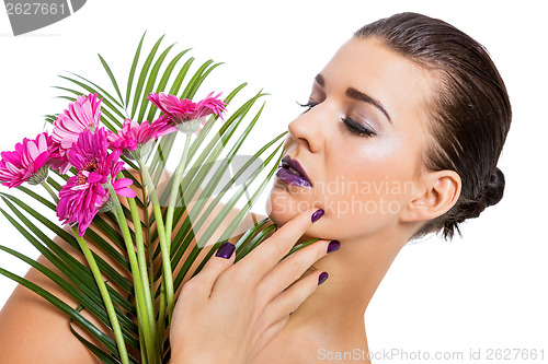 Image of Beautiful woman in purple make-up