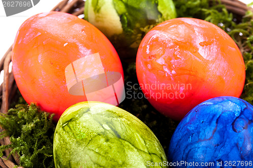 Image of Basket of brightly coloured Easter Eggs