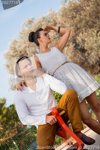 Image of Elegant trendy young couple