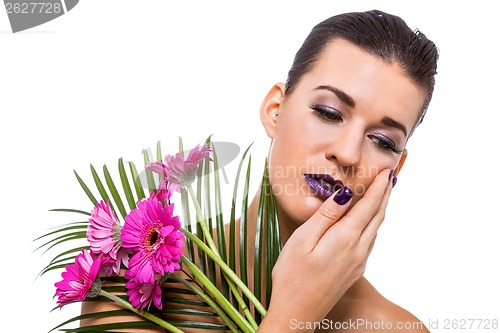 Image of Beautiful woman in purple make-up