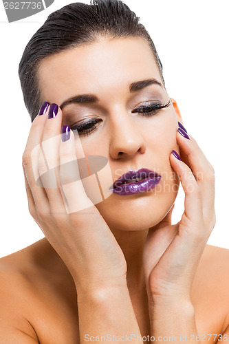 Image of Graceful attractive woman with purple lips and nails