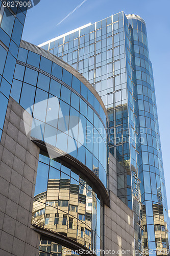 Image of Modern building against blue sky