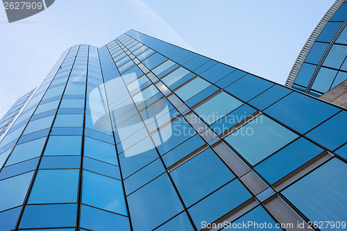 Image of Modern building against blue sky