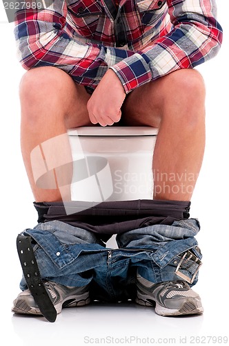 Image of Man on toilet bowl