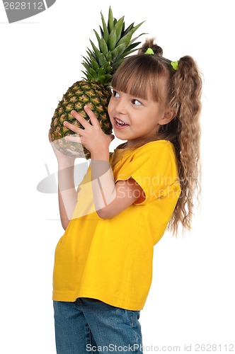 Image of Little girl with pineapple