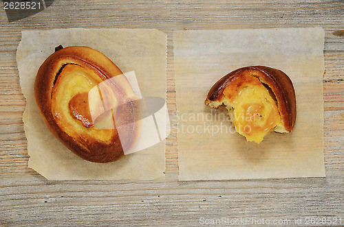 Image of dallas bun and half  on wooden