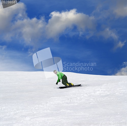 Image of Snowboarder on ski slope