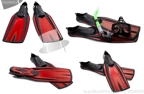 Image of Set of red swim fins, mask and snorkel for diving