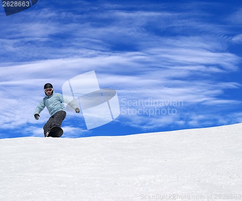 Image of Snowboarder on ski slope